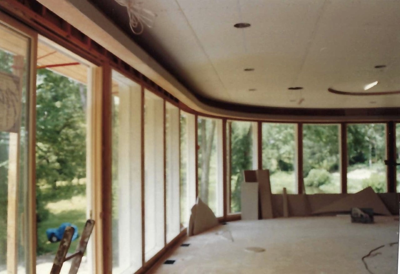 a room with floor to ceiling windows