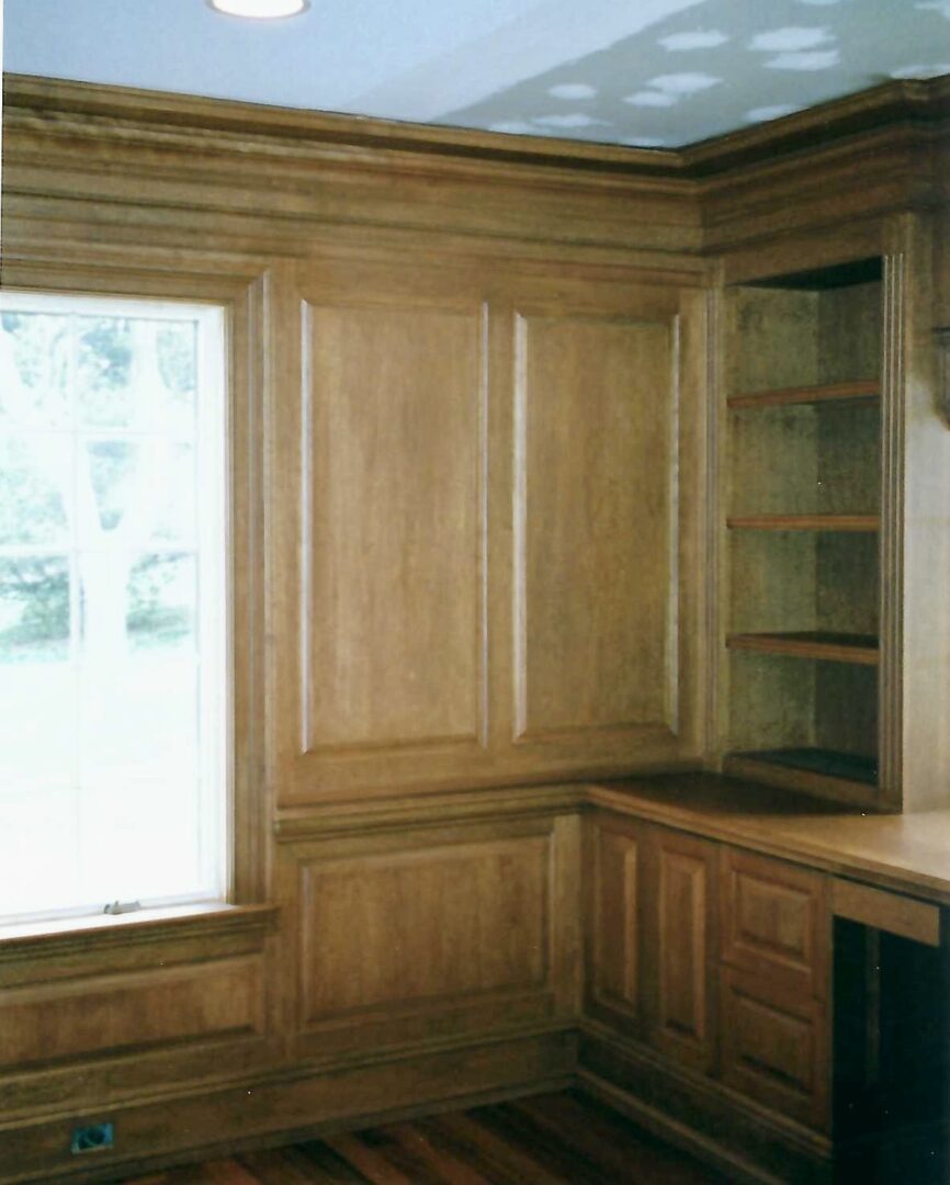 built-in wooden cabinet with shelves