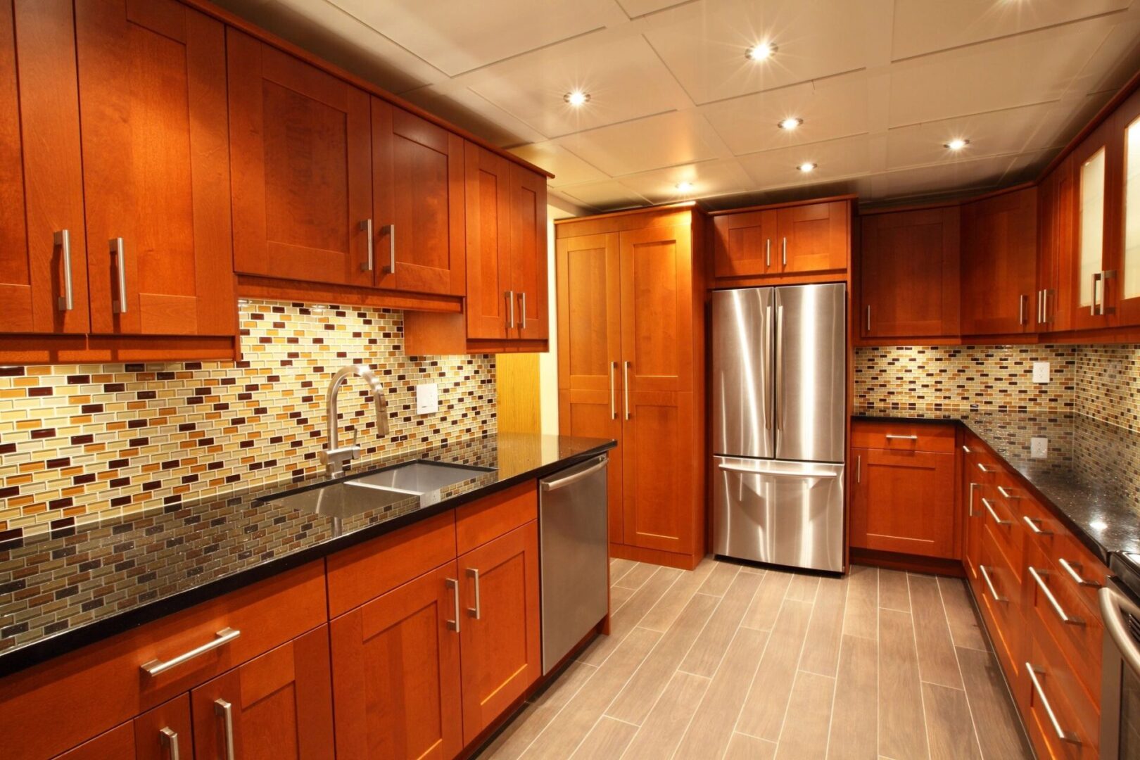 spacious kitchen area with a big refrigerator