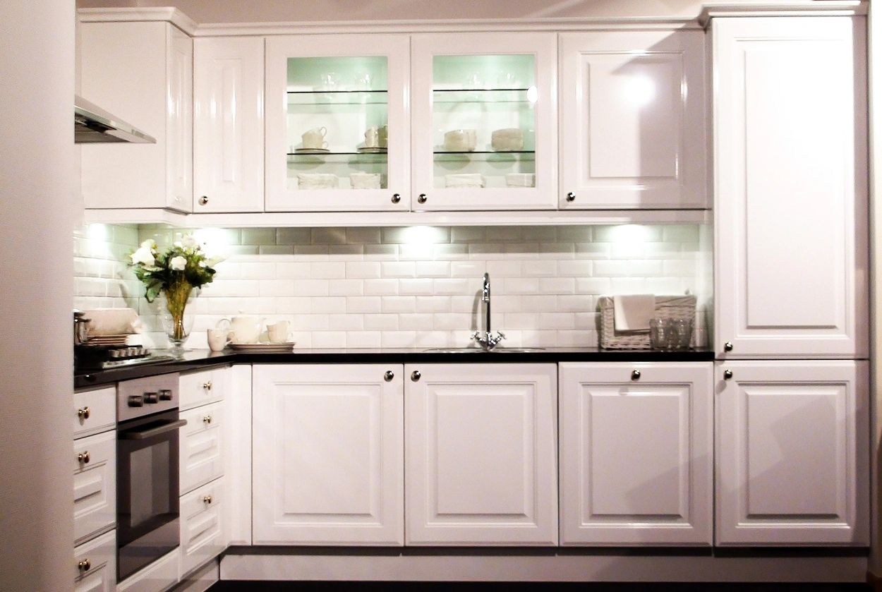 black and white-themed kitchen area