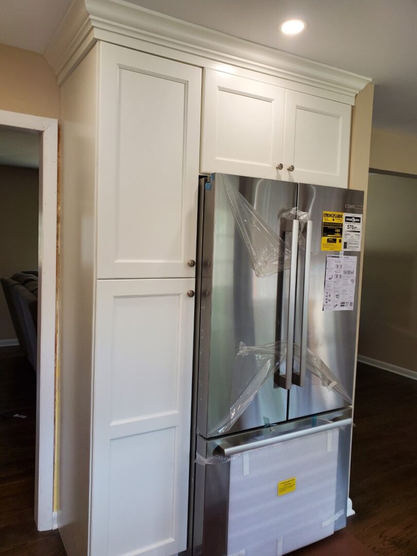 A brand new fridge set in grey color