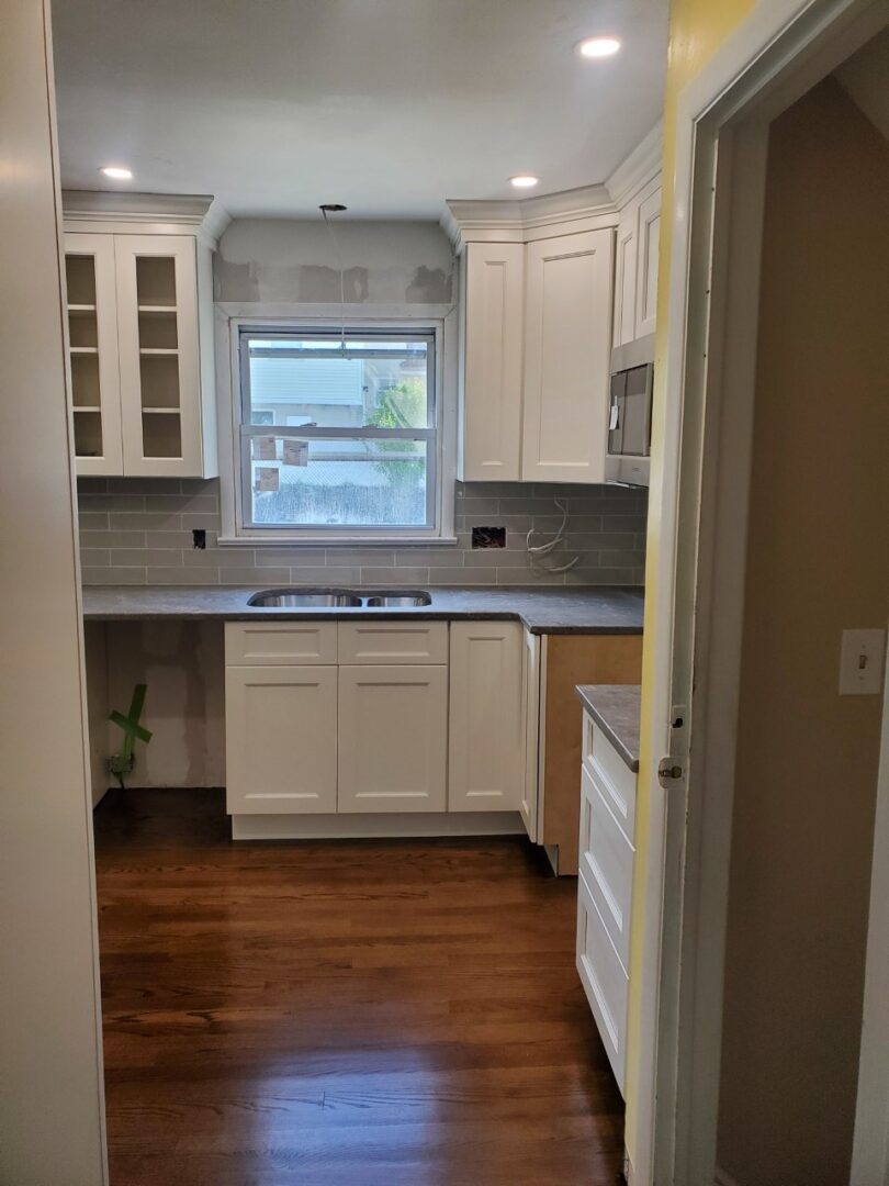 A window placed in the kitchen room