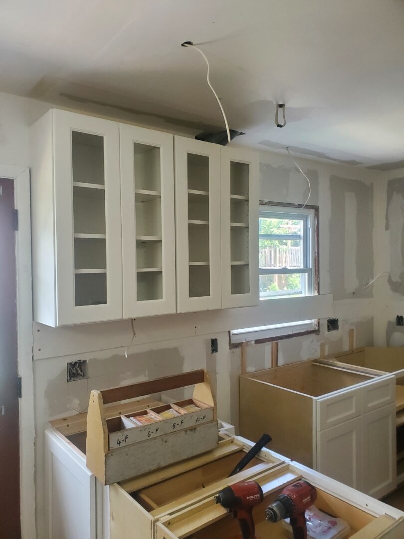 A cabinet set for kitchen in white color